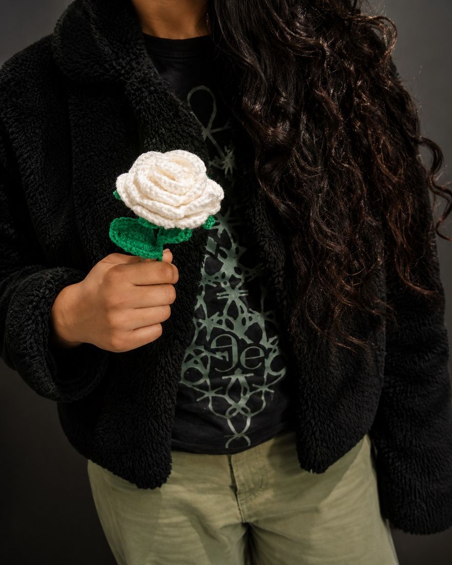 Crochet rose with leaves, worn in the hair